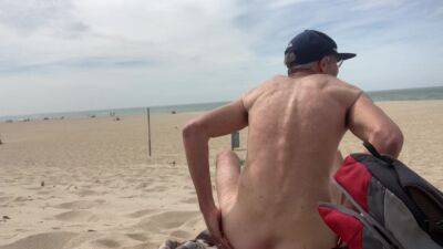 Dildo anal insertion on public beach - voyeurhit.com